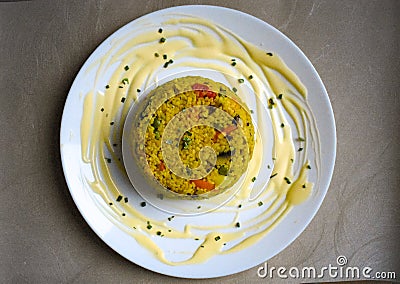 Bulgur with vegetables on plate Stock Photo
