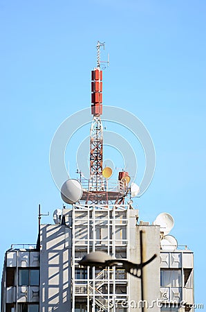 Buliding antenna against sky Stock Photo