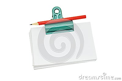 Bulldog clip holding loose memo papers Stock Photo