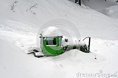 Bulldozer covered with snow Stock Photo
