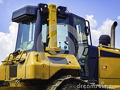 Bulldozer heavy duty tractor close up cabin Stock Photo