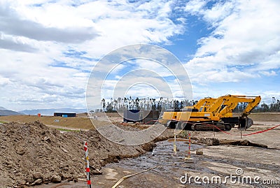 Bulldozer in the middle of a construction. Stock Photo