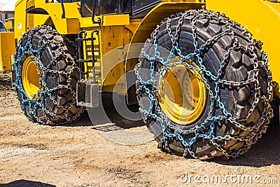 Bulldozer With Tire Chains Stock Photo