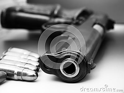 Bullet and gun Stock Photo