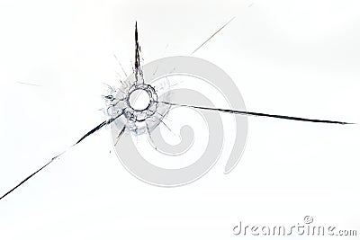 Bullet hole in glass close up on white background Stock Photo