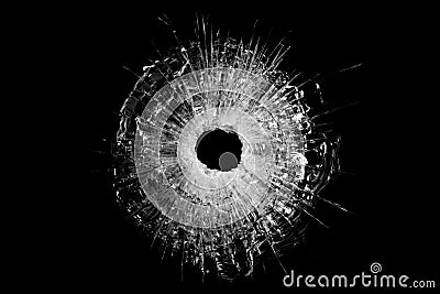 Bullet hole in glass isolated Stock Photo