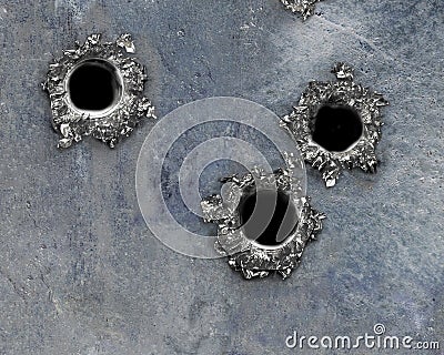 Bullet hole on rusted metal Stock Photo