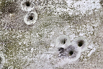 Bullet holes in a german traffic sign from a gun shooting exercise Stock Photo