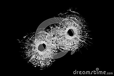 Bullet holes isolated on black Stock Photo