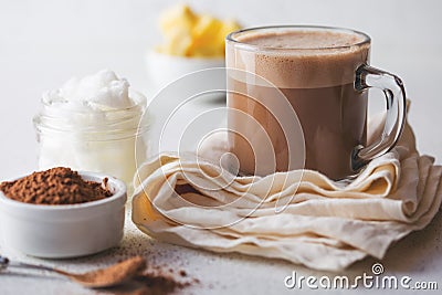 BULLETPROOF CACAO. Ketogenic keto diet hot drink. Cacao blended with coconut oil and butter. Cup of bulletproof cacao Stock Photo
