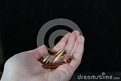 Bullets in hand Stock Photo