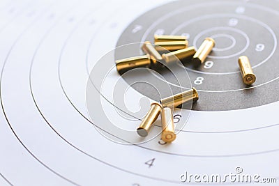 Bullets on paper target for shooting practice Stock Photo