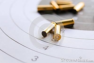Bullets on paper target for shooting practice Stock Photo