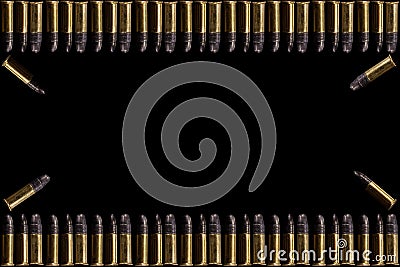Bullets and shell bullets on white background. A group of 9mm bullets for a gun isolated on black background. Ammunition on white Stock Photo