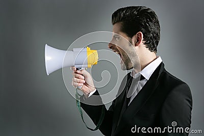 Bullhorn businessman megaphone profile shouting Stock Photo