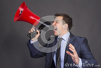 Bullhorn businessman megaphone profile shouting Stock Photo