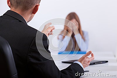 Bullying on the job meeting Stock Photo