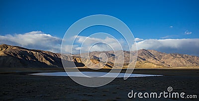 Bulunkul, Tajikistan: Yashikul lake in the Pamir mountains near Bulunkul in Tajikistan Stock Photo
