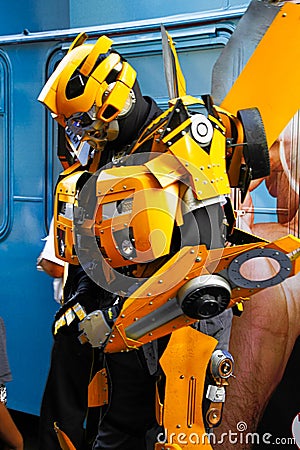 Bumblebee robot costume performs Editorial Stock Photo