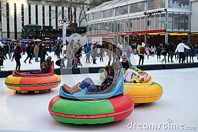 Bumper Cars on Ice at the Bryant Park Winter Village in New York City Editorial Stock Photo