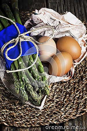 Bunch of asparagus with eggs on centerpiece Stock Photo