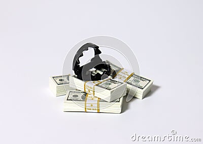 A bunch of $ 100 bills and a miniature trap. Stock Photo