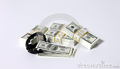 A bunch of $ 100 bills and a miniature trap. Stock Photo