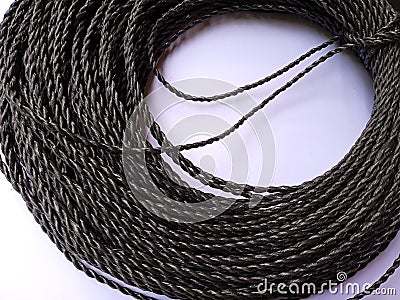 A bunch of black threaded rope Stock Photo