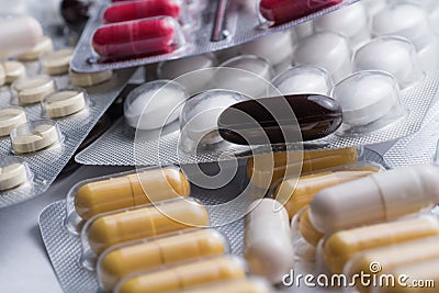 A bunch of blister packs of tablets, pills coronavirus. flu and cold medications. Copy space, Close up, macro Stock Photo