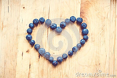 A bunch of blueberries shaped like a heart Stock Photo
