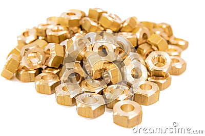 A bunch of bronze and brass nuts on isolate Stock Photo