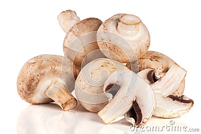 A bunch of champignon mushrooms isolated on white background Stock Photo