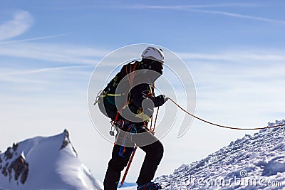 a bunch of climbers in the mountains. Climbing and mountaineering sport. Teamwork concept. Stock Photo