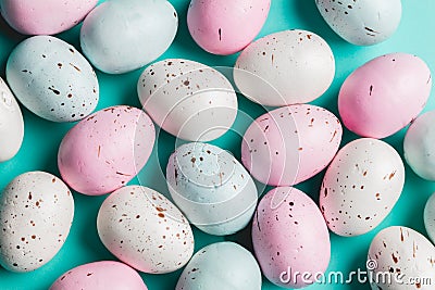 Bunch of colorful pastel eggs on blue background. Stock Photo