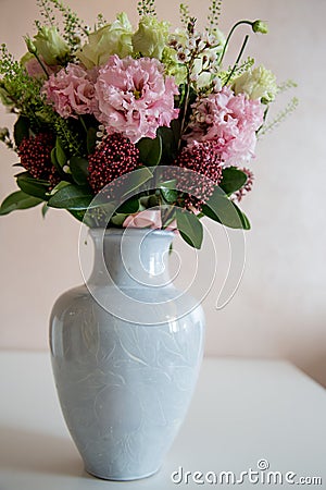 Bunch of elegant flowers in vase as love or Valentines day attribute Stock Photo