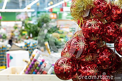 A bunch of glowing red balls with golden snowflakes, christmas sale concept. Blurred background backdrop design, christmas Stock Photo