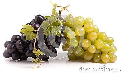Bunch of green and blue grape with leaves isolated on white background Stock Photo