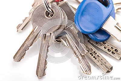 Close up on a bunch of keys on white background. Stock Photo