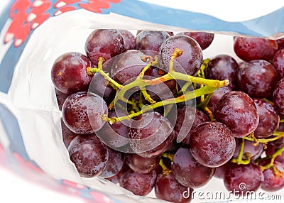 A bunch of large grapes in a package Stock Photo