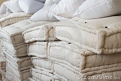 A bunch of mattresses and pillows for refugees Stock Photo