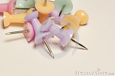 A bunch of multicolor bright pins on paper, soft focus Stock Photo