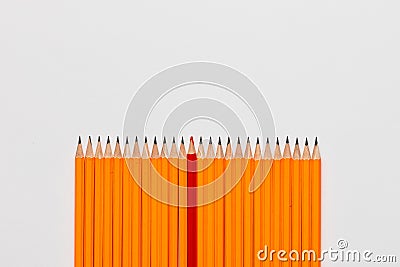 A bunch of pencils on white background, shot from above, aligned at the bottom, closeup Stock Photo