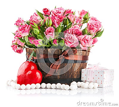 Bunch pink roses with gift to day saint valentine Stock Photo