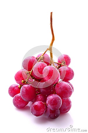 Bunch of red grapes isolated on white Stock Photo