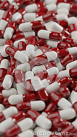 Bunch of Red white capsule pills on a white background - Medicine healthcare medicaments - vertical Stock Photo