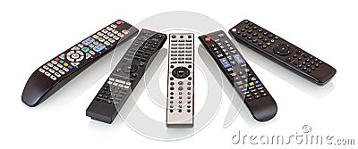 Bunch of remote controls for TV , Blu Ray player, satellite receiver, home cinema amplifier isolated on white background. Stock Photo