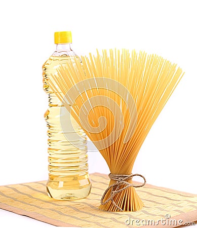 Bunch spaghetti, oil, on a table-napkin. Stock Photo