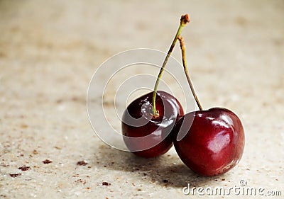 Bunch of sweet cherries on a granite table Stock Photo