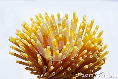 Background with bunch of uncooked macaroni noodles Stock Photo