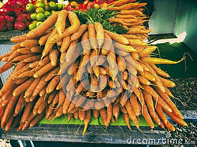 Bunches of carrots at farmers market Stock Photo